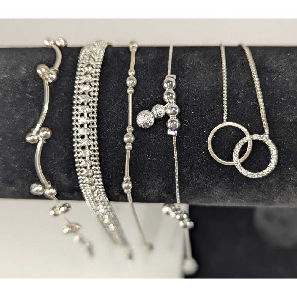 Set of Five Silver Tone Bracelets